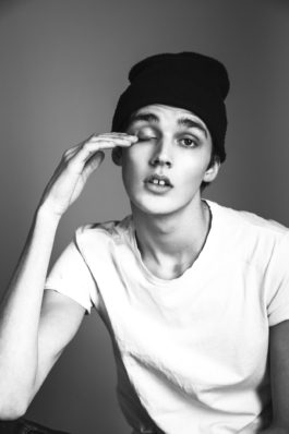 Senna van Plateringen by Robin Kater , fashion and people photographer from Berlin. Senna is wearing a white t-shirt and a black beanie. hair & make up by Timo Bloom . 